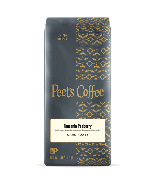 Peet's Coffee Tanzania Peaberry dark roast coffee package on a dark background
