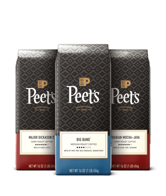 Three Peet's coffee bags with different flavors on a black background