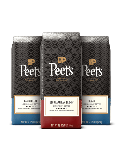 Three Peet's coffee bags with different blends on a black background