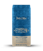 Peet's Coffee Ethiopian Super Natural Dark Roast Coffee beans in a blue and tan 16 ounce bag
