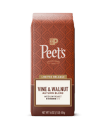 Peet's Vine & Walnut Autumn Blend coffee bag in a limited release medium roast, 16 oz. The packaging features a terracotta patterned background with a cream and brown label at the bottom, set against a solid dark green background.