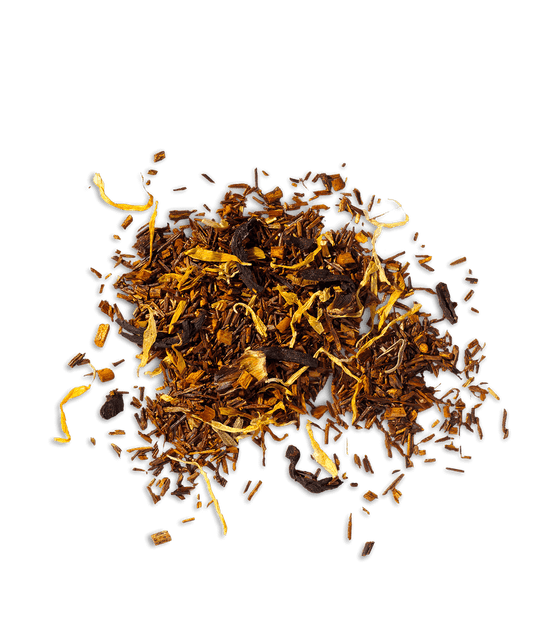 A pile of dry, caffeine-free organic rooibos tea leaves mixed with pieces of tropical fruit and blossoms.